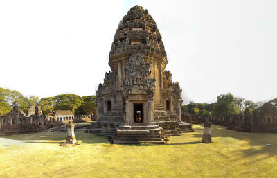 View of temple against building