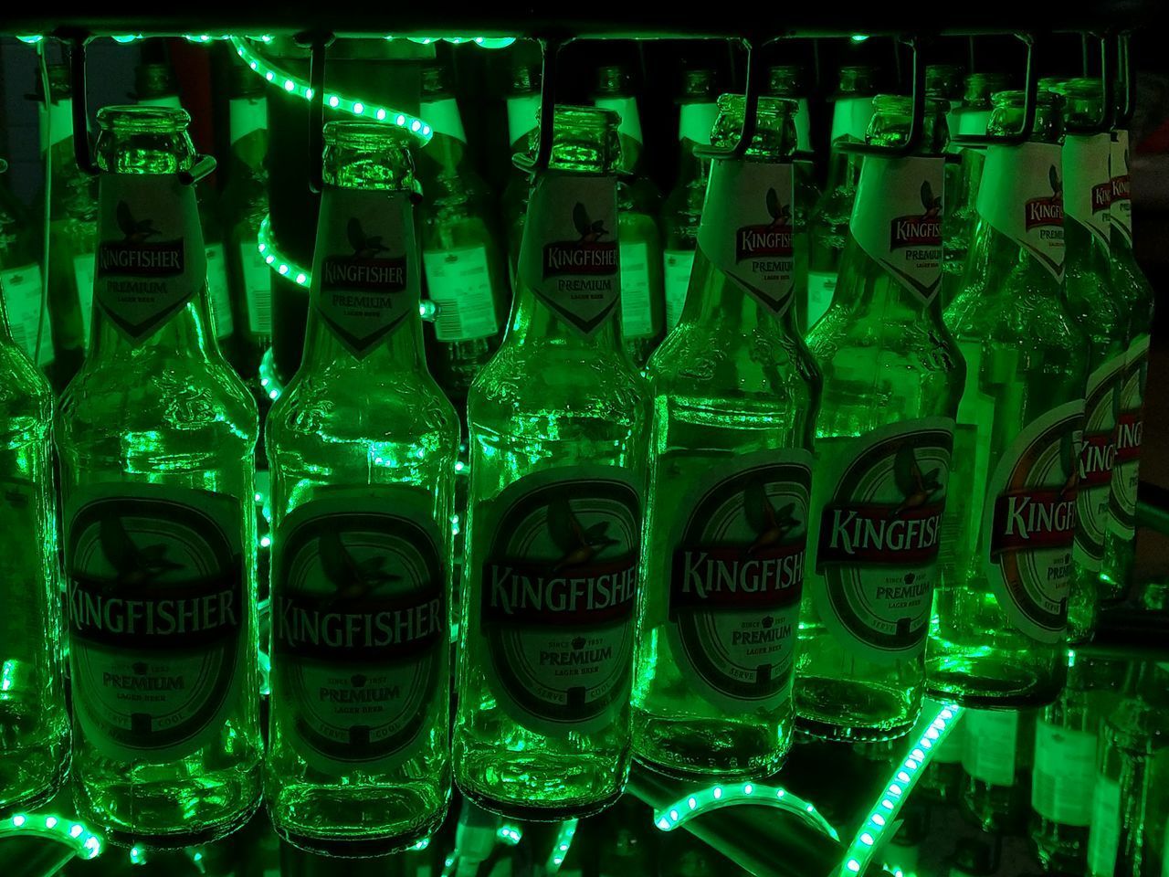 CLOSE-UP OF BEER BOTTLES