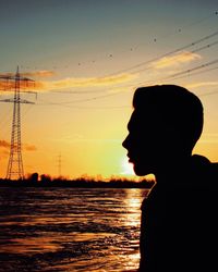 Silhouette of people at sunset