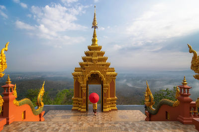 View of temple building against sky