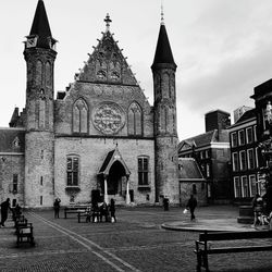 Group of people in front of building