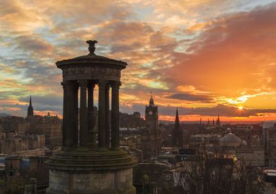 View of cityscape against sky during sunset