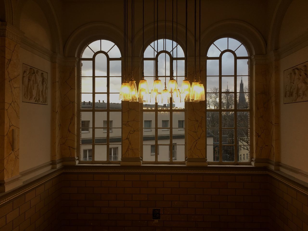 window, architecture, built structure, arch, indoors, building, no people, day, glass - material, wall, illuminated, transparent, sunlight, wall - building feature, lighting equipment, glass, the past, nature, architectural column, ceiling