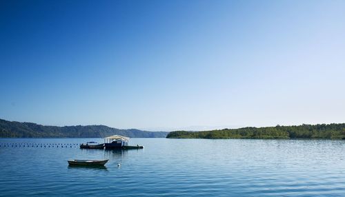 Scenic view of lake against clear sky