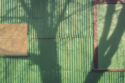 Full frame shot of metallic green wall