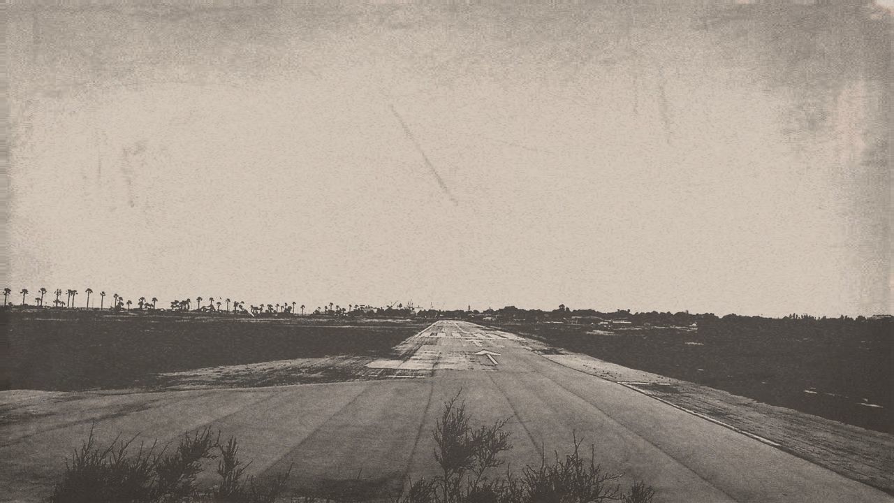 transportation, road, the way forward, road marking, street, diminishing perspective, vanishing point, copy space, land vehicle, car, clear sky, outdoors, no people, day, empty, empty road, mode of transport, nature, built structure, country road