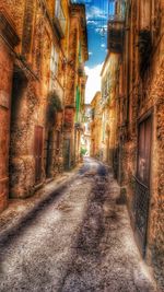 Narrow alley along buildings