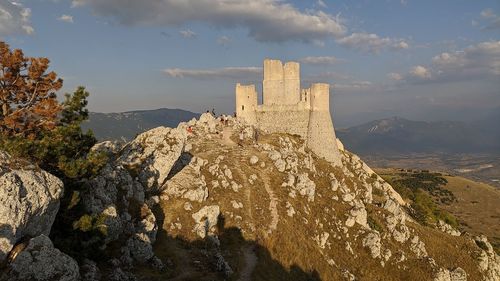 View of castle against cloudy sky