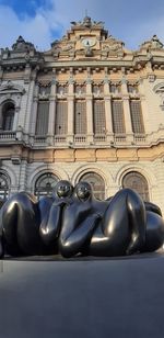 Low angle view of sculptures on building