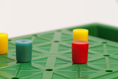 Close-up of tea cup on table against white background