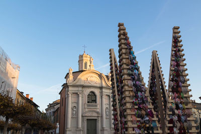 Low angle view of buildings against blue sky