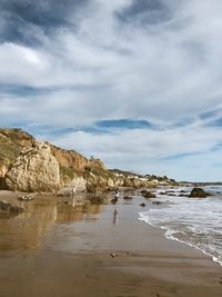 Scenic view of beach against sky