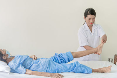 Full length of a young man lying down