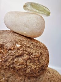 Close-up of bread against white background