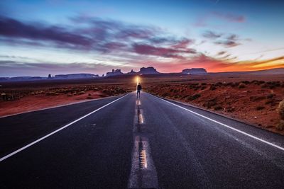 Road against sky during sunset