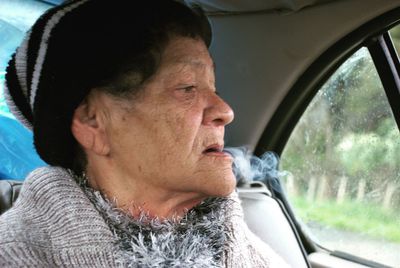 Close-up of man smoking in car