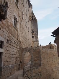 Low angle view of historic building against sky