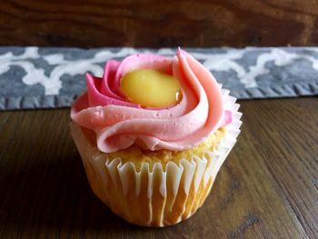 Pink iced cupcake