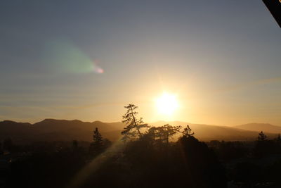 Scenic view of landscape against sky during sunset