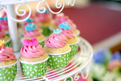 Close-up of cupcakes tier colorful party dessert