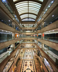 Interior of illuminated shopping mall