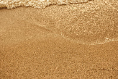 Full frame shot of sand on beach