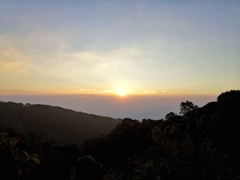 Scenic view of mountains against sky during sunset