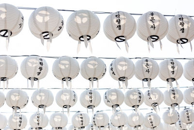 Low angle view of lanterns hanging on ceiling