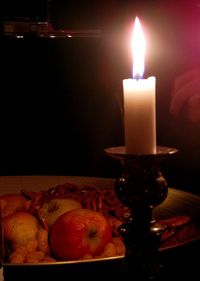 Close-up of lit candle