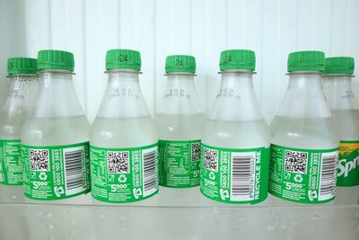 Close-up of green bottles