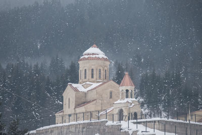 Building against clear sky during winter