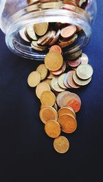 High angle view of coins