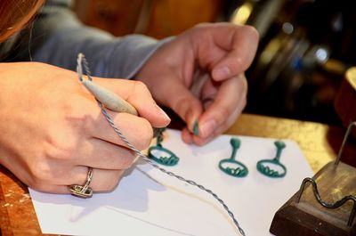 Jeweler working at her workshop