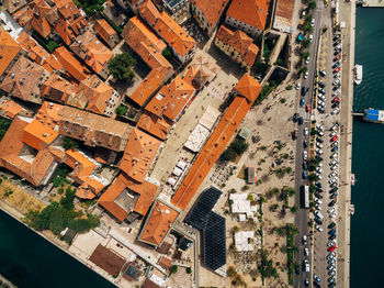 High angle view of street amidst buildings in town