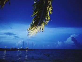 Scenic view of sea against sky at night