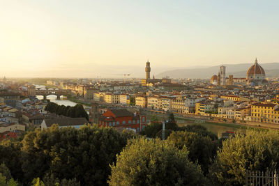 River arno with palazzo vecchio palace and cathedral of santa maria del fiore, florence, italy