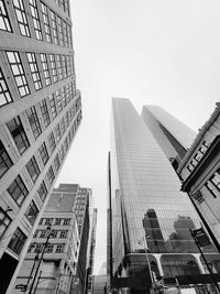 Low angle view of modern buildings against clear sky