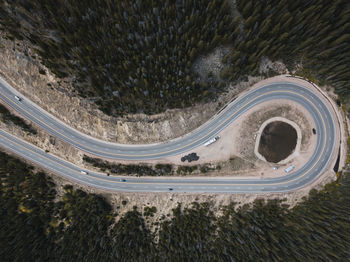 High angle view of tire tracks on road