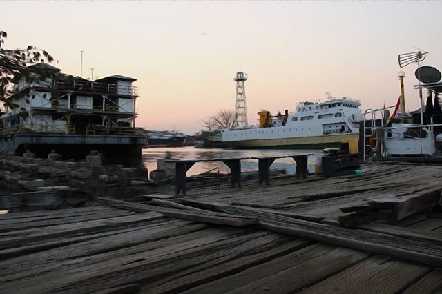 built structure, architecture, building exterior, transportation, bridge - man made structure, clear sky, sky, connection, city, water, street light, railing, river, sunset, outdoors, pier, no people, copy space, mode of transport, incidental people