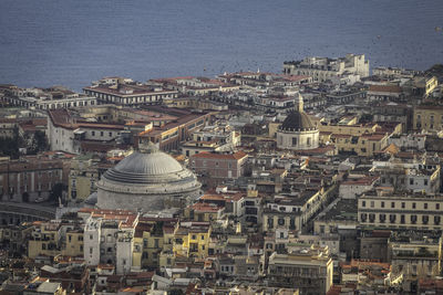 High angle view of illuminated buildings in city