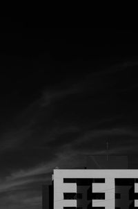 Low angle view of building against sky at night