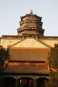 Low angle view of temple building against clear sky