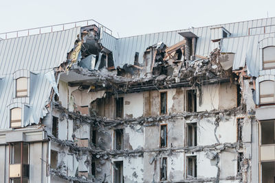 Photo of destroyed building, demolition of a building, house ruins, rebirth, reconstruction