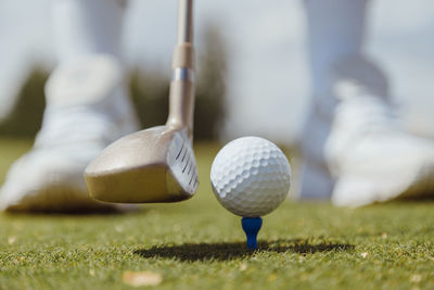 Close-up of golf ball on grass