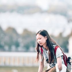 Young woman standing outdoors