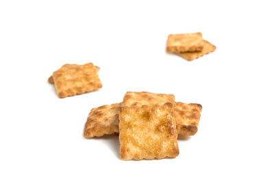 Close-up of cookies against white background