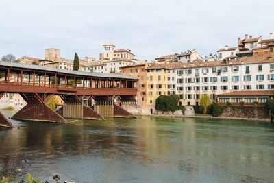 Bridge over river against sky