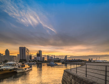 Panorama from osanbashi pier port of the landmark tower illuminated by the sunset sky of yokohama.