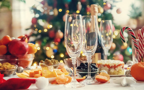 Close-up of wineglasses on table