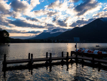 Scenic view of lake against sky during sunset